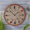 SG 12IN GARDEN TOOLS WALL CLOCK