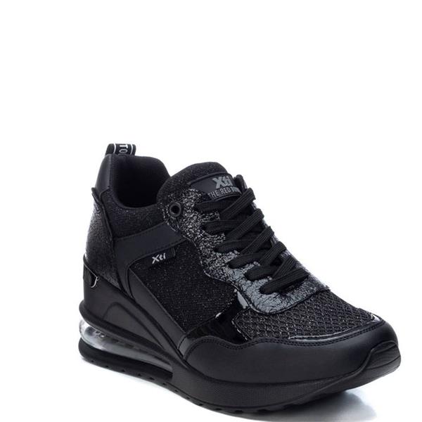 xti black wedge trainers