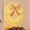 70CM LIT GOLDEN ELEGANCE WREATH WITH RED BOW