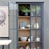 ANTIQUE BLACK DISPLAY CABINET WITH GLASS DOORS AND DRAW